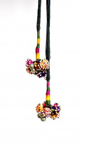 Sitaben. Hair tie. buttons, bells, beads, thread. 2010
